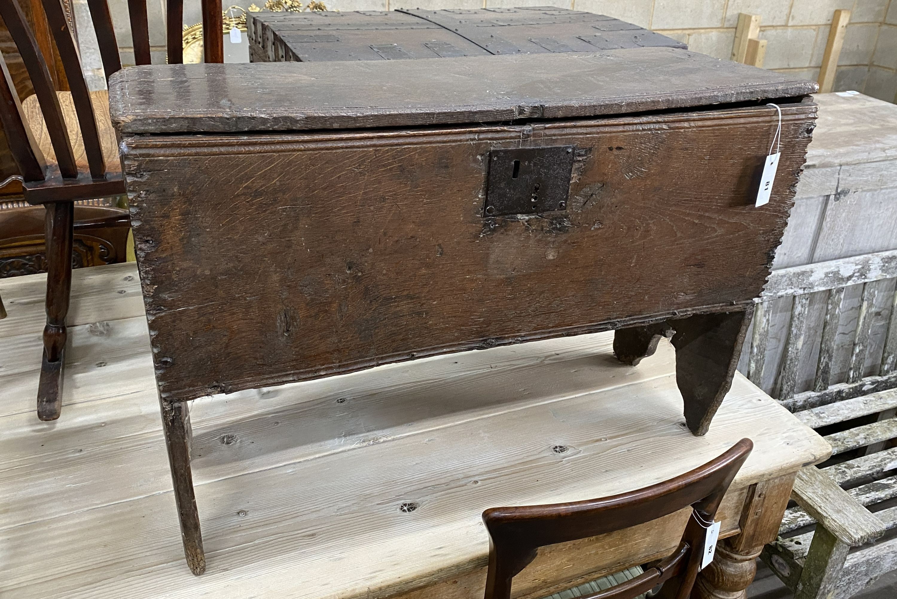 A 17th century oak six plank coffer, length 88cm, depth 33cm, height 60cm